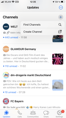 Phone showing WhatsApp updates and channels