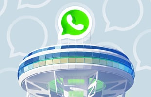 WhatsApp logo above office building for WhatsApp enterprise blog post for charles