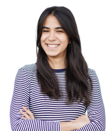 Happy young woman with dark hair, wearing a striped shirt, arms crossed.